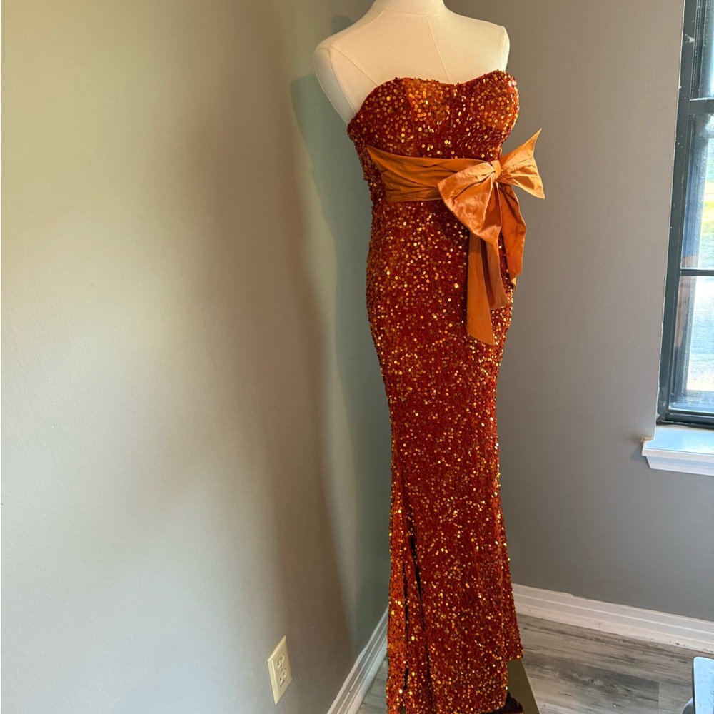 Glamorous Strapless Sequin Dress with Bow Accent